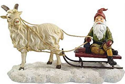 Santa on sled pulled by Goat